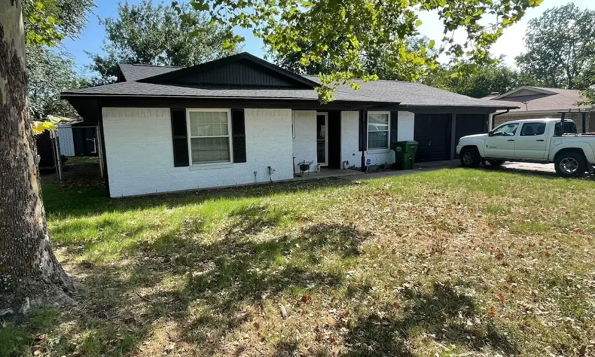 Professional roofing crew working on a residential roof in Bountiful